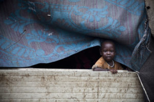 Malakal IDP camp, South Sudan. Fighting has forced more than a million people from their homes, and up to 50,000 children are at risk of dying from malnutrition if they don't receive adequate humanitarian aid. Photo Credit: Simon Rawles/Oxfam